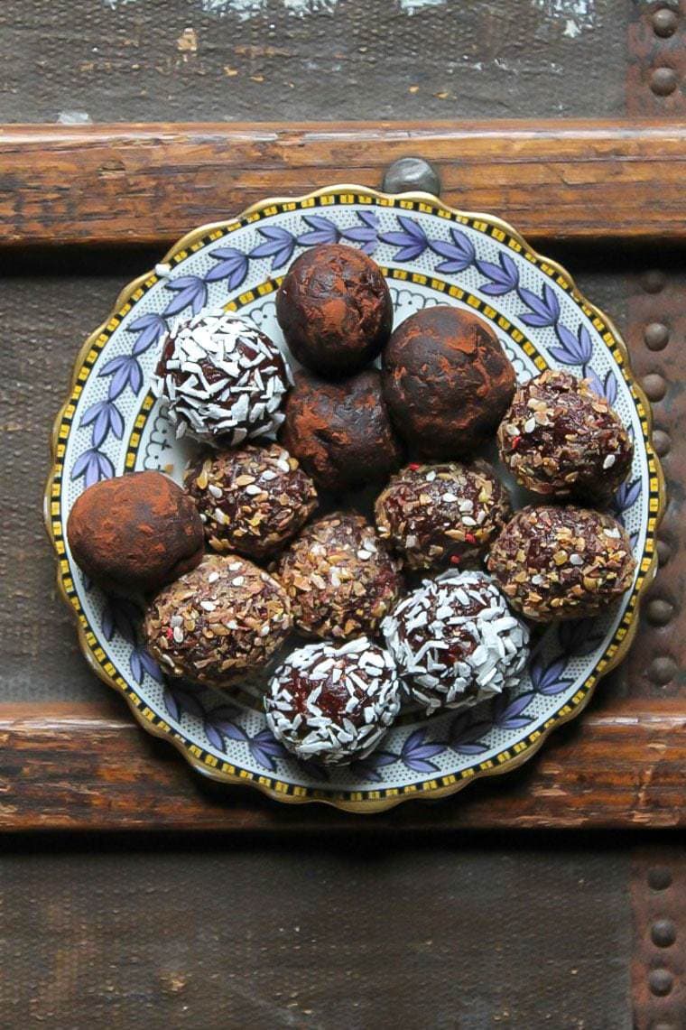 Bliss balls on a plate.