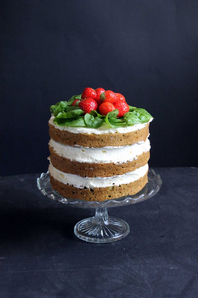 Spinach Coconut Yogurt Cake with strawberries on top