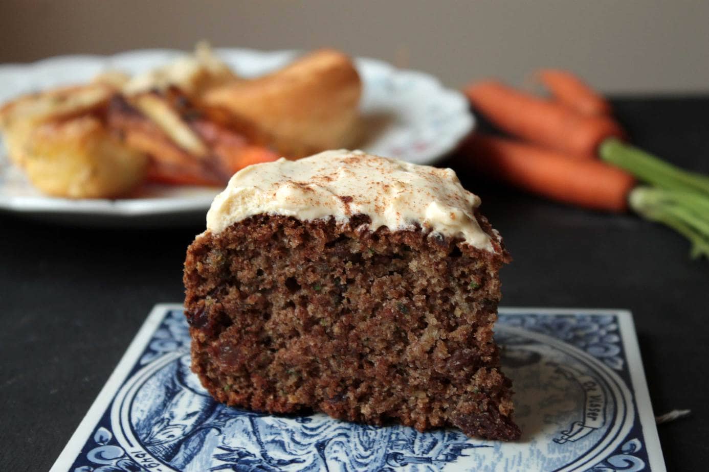 Roast Dinner Waste Cake (Maple and Cinnamon Cake with Carrot, Parsnip and Potato Peelings) on a blue and white tray