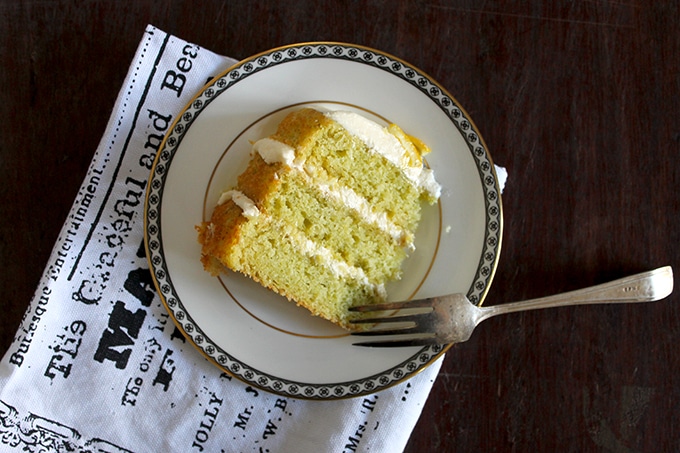 A piece of cake on a plate with a fork.