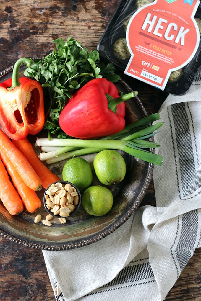 Ingredients for a Vegan Rice Noodle Salad with Peanut Sauce - carrots, red peppers, scallions, peanuts, lime