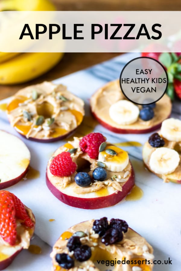 Apple pizzas are a fun and tasty healthy snack for kids that you can customise however they like. They're a super quick recipe for breakfast, lunch, dessert or a snack. Endlessly customisable, this healthy snack will definitely delight children. #healthykidssnacks #healthykidsfood #vegetariankids