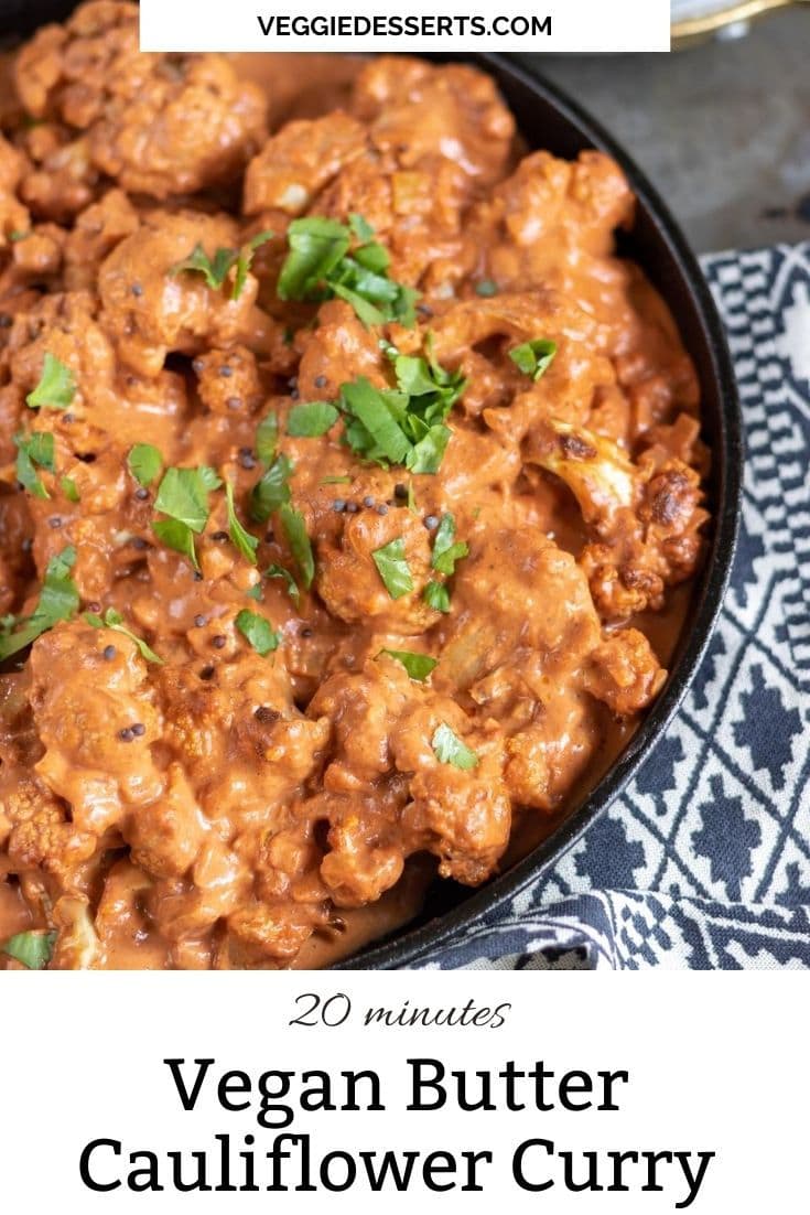 Serving dish of curry with text reading: Vegan Butter Cauliflower Curry.
