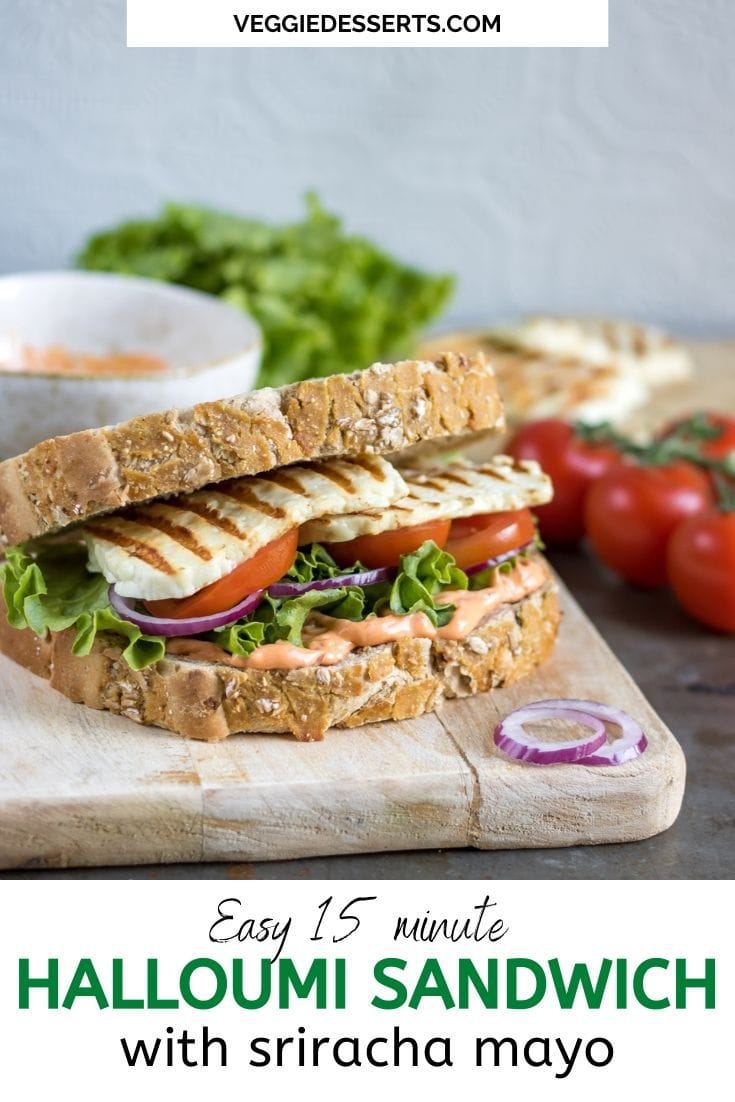 Sandwich on a board, with text: Easy 15 minute Halloumi Sandwich with Sriracha Mayo.