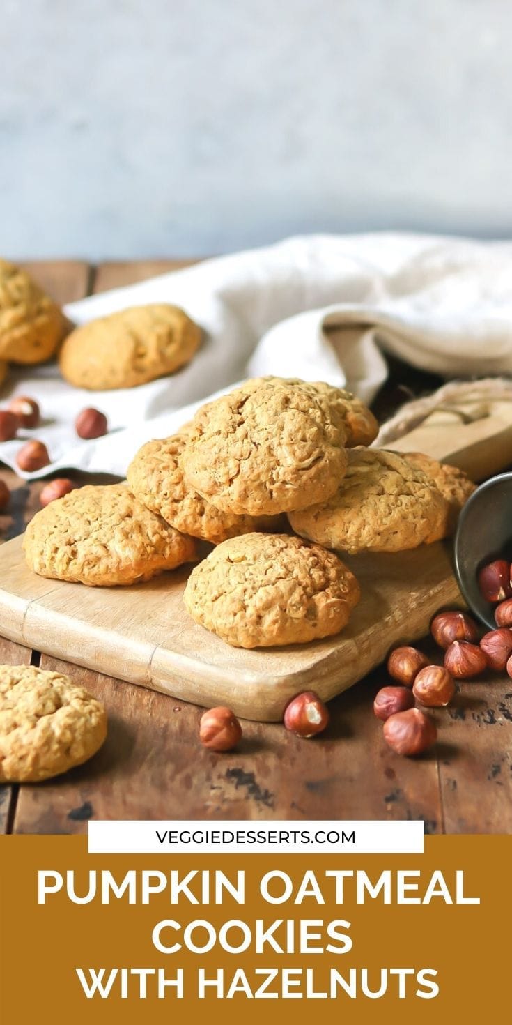 Cookies on a board with text: pumpkin oatmeal cookies with hazelnuts.