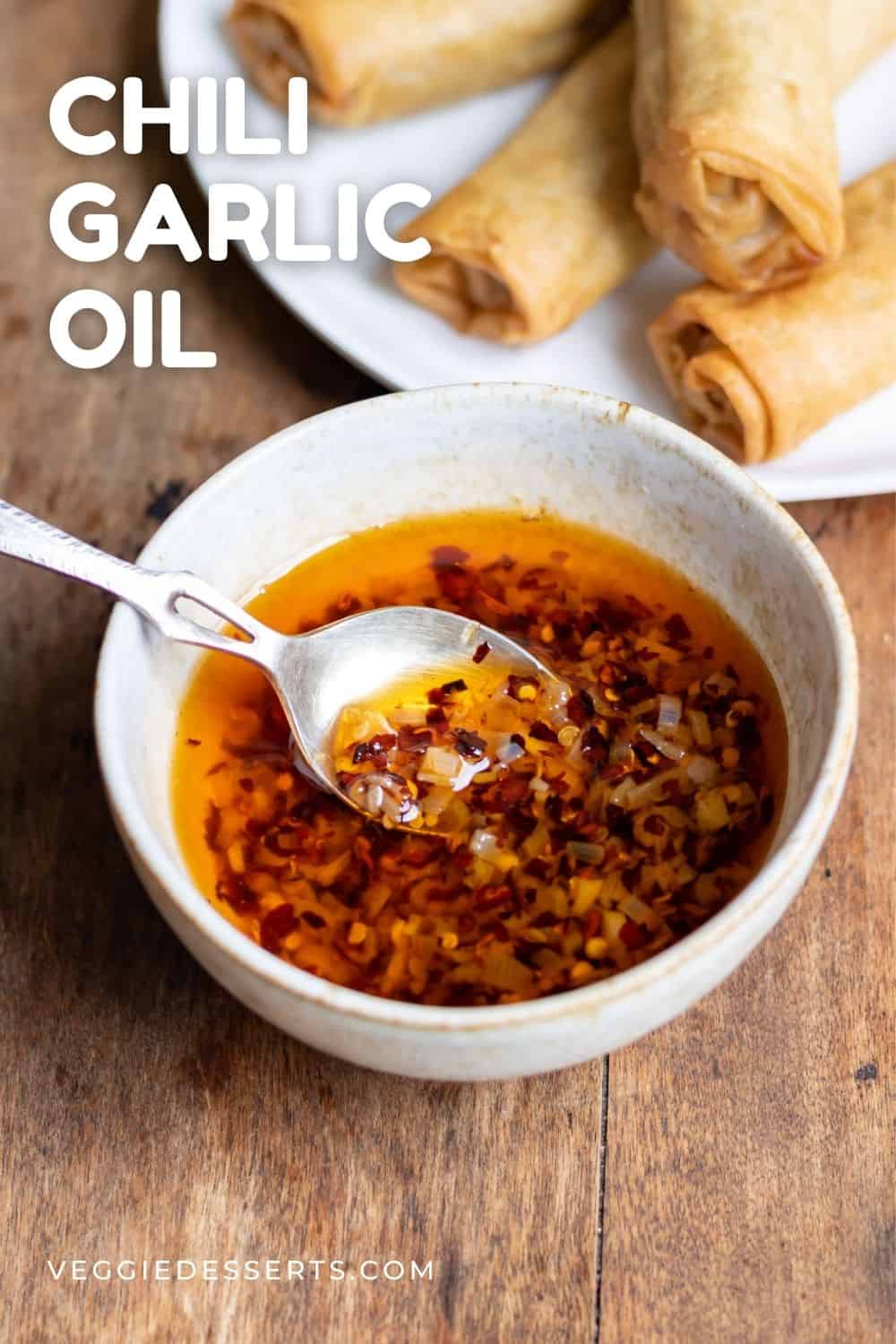 Bowl of oil with text: Chili Garlic Oil.