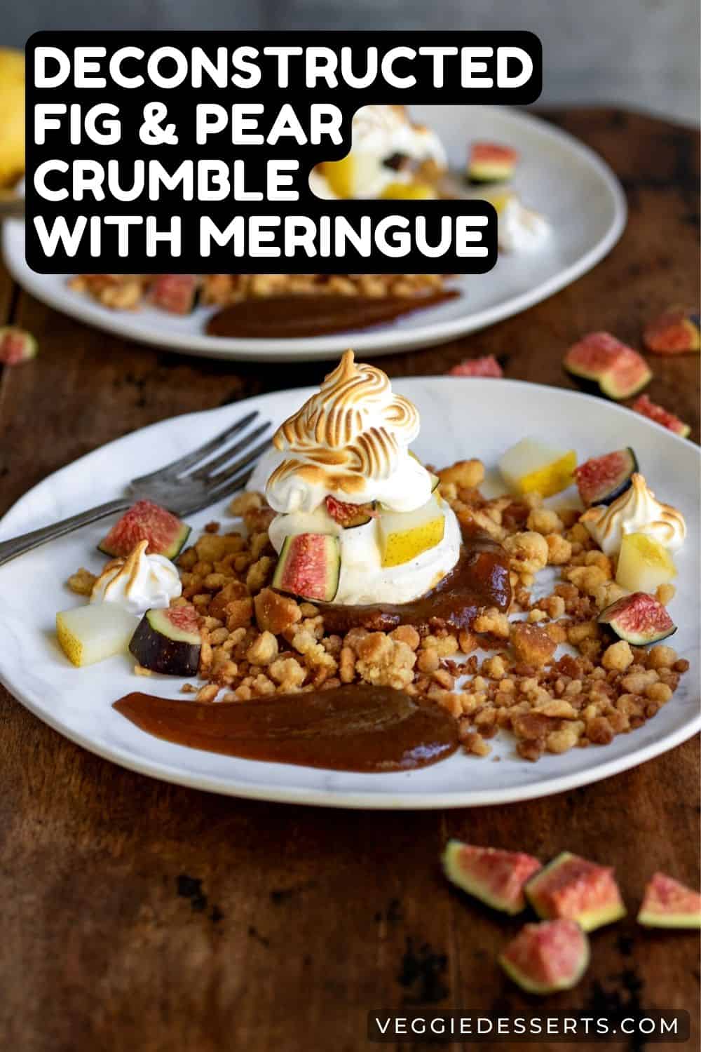 A table with two plates of fig and pear crumble.