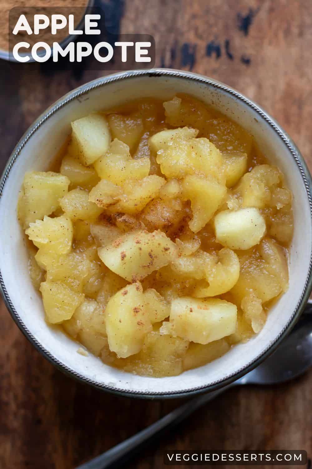 Bowl of cooked apples, with text: Apple Compote.