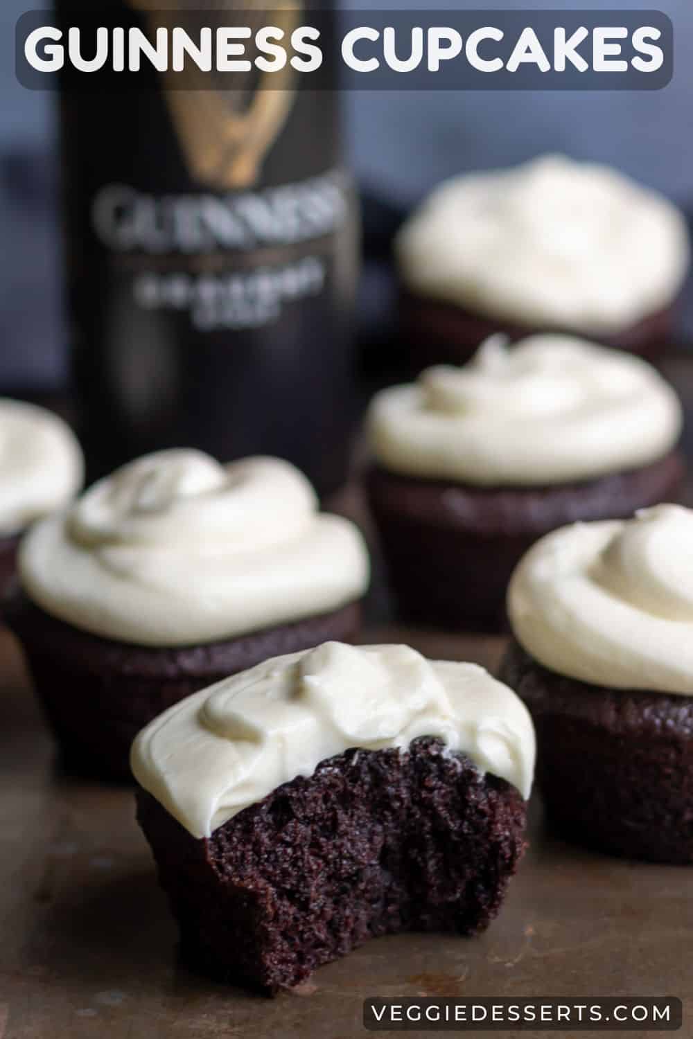 Guinness chocolate cupcakes with one with a bite out, and text: Guinness Cupcakes.