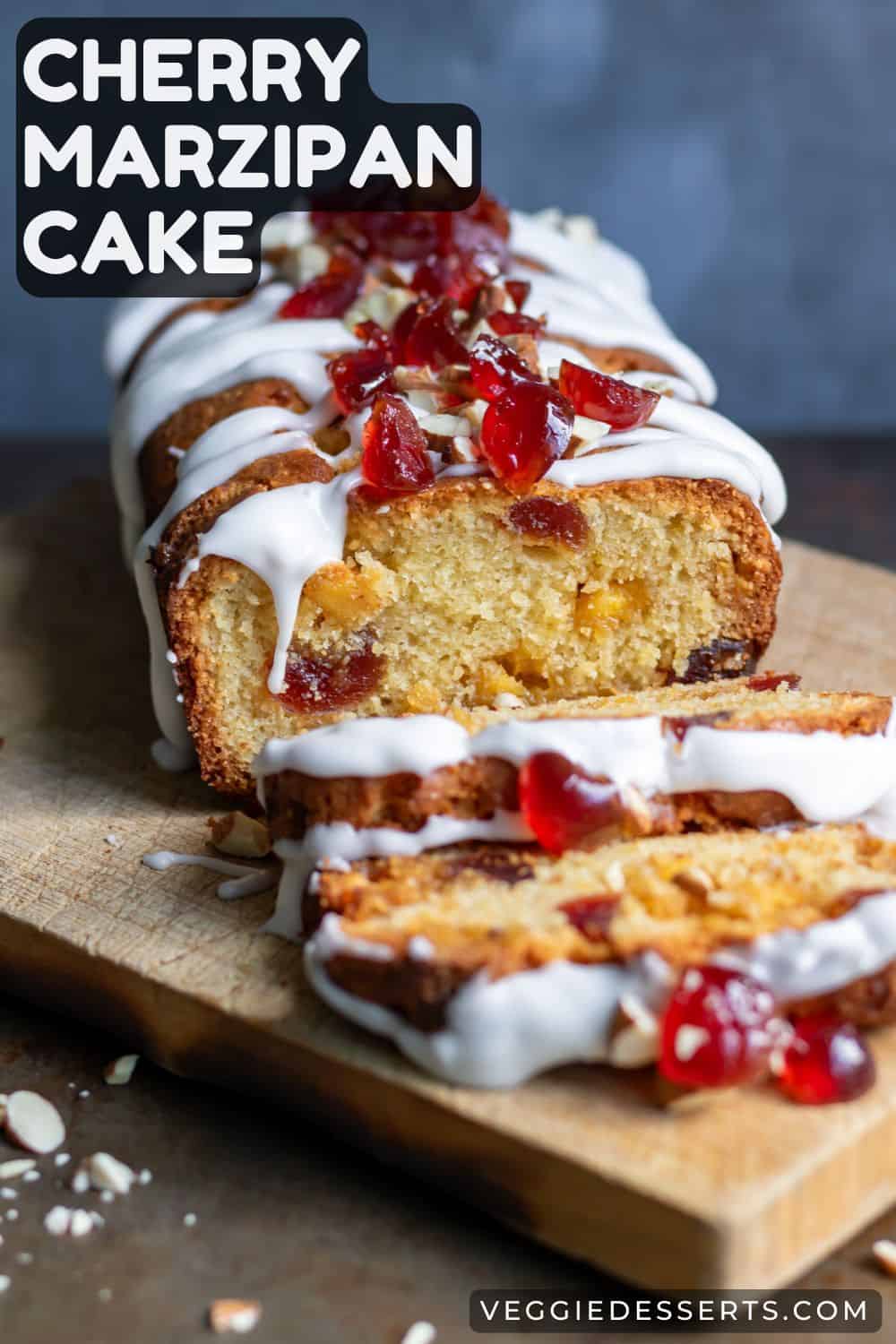 A loaf cake with slices, with text: Cherry Marzipan Cake.
