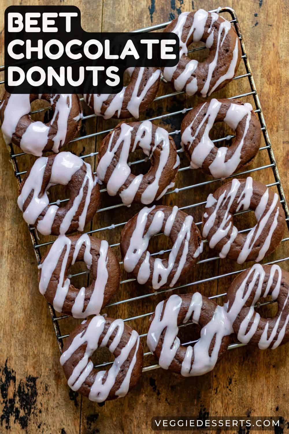 Rows of donuts on a wire rack, with text: Beet Chocolate Donuts.